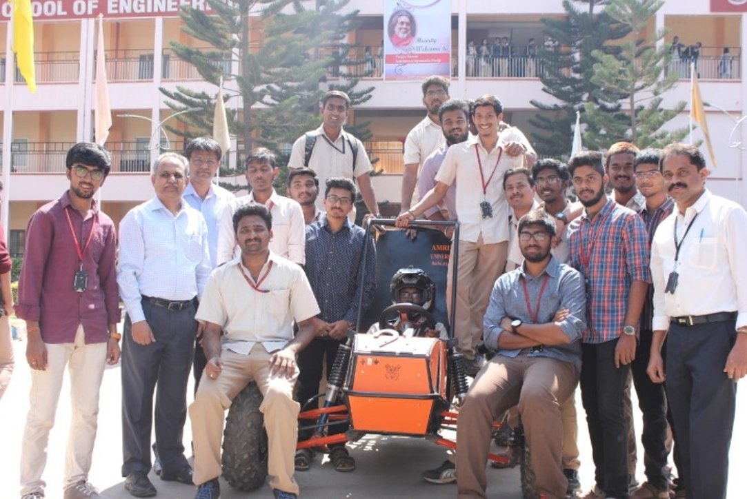 BAJA SAE team photo with vehicle